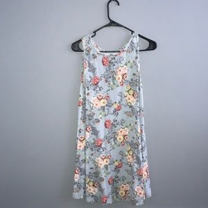 My story brand - blue flowery dress.